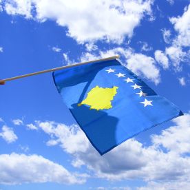 Kosovo Hand Waving Flag